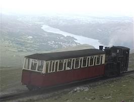 The Snowdon Mountain Railway steam train heads up to the station at the summit